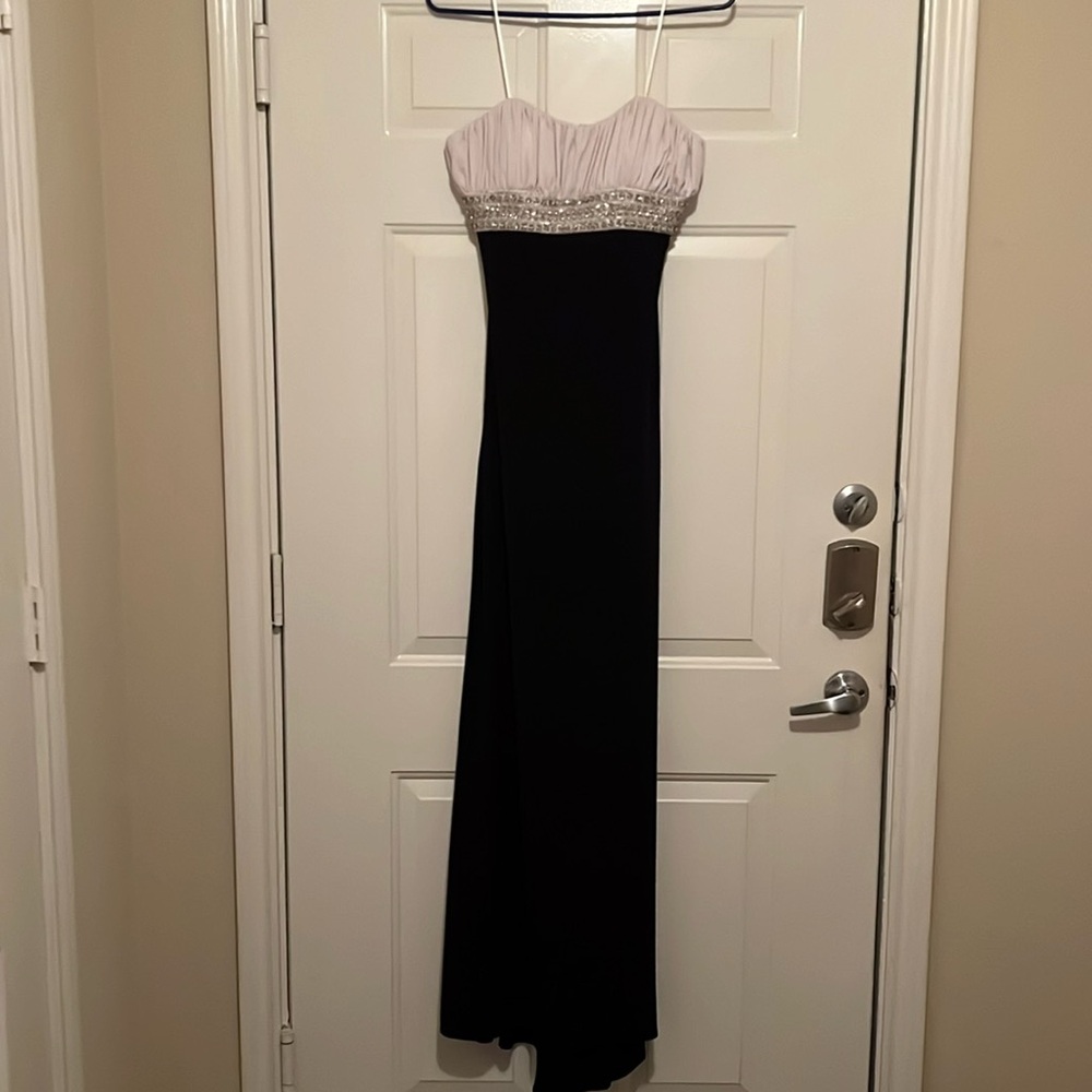 Formal strapless gown with small train.